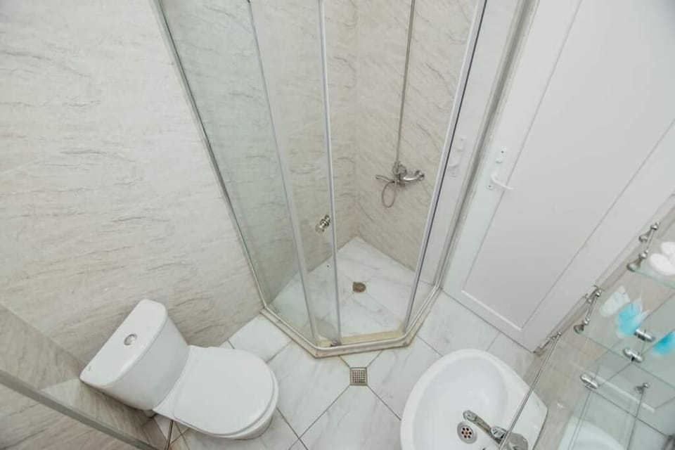 Basic Double Room, Balcony, Partial Sea View | Bathroom | Free toiletries, hair dryer, towels, soap