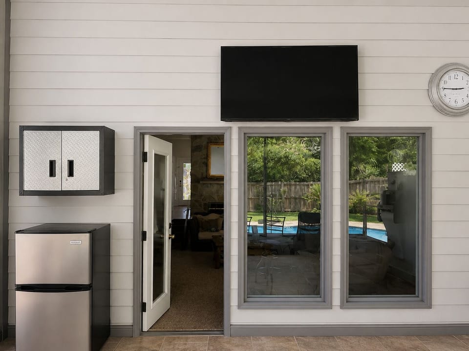 Back porch with big screen TV. 