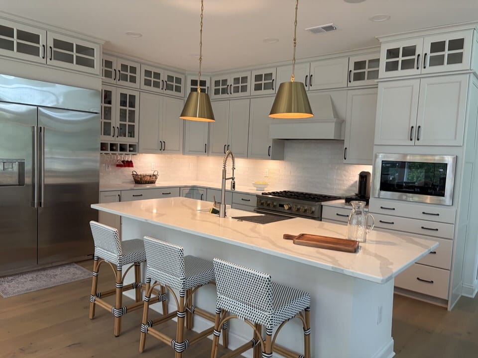 Professional Kitchen with Monogram Appliances & Farm Sink.