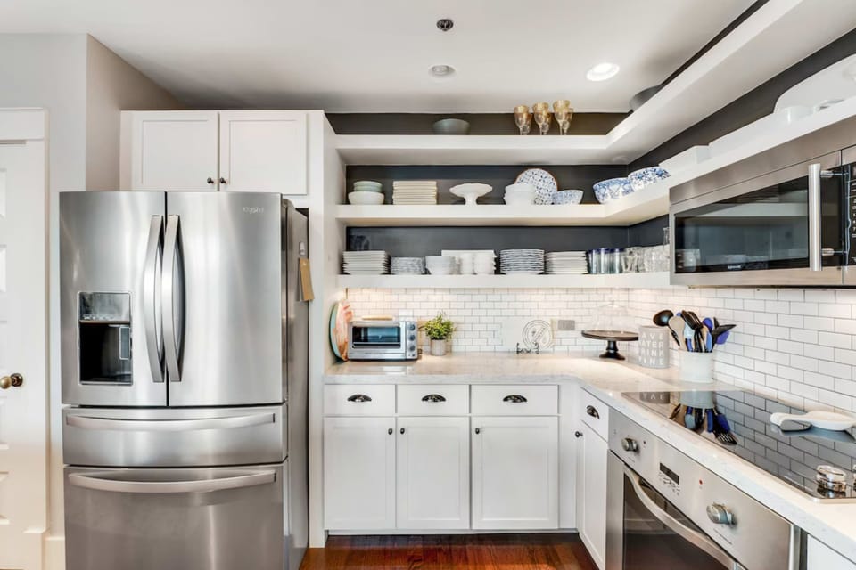 Designed for entertaining, this chef-inspired kitchen keeps everyone connected from meal prep to movie night.