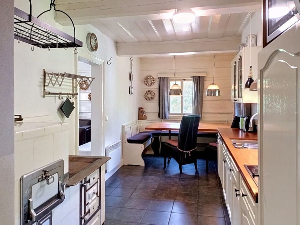 Flooring, Wood, Interior Design, Furniture, Cabinetry, Floor, Ceiling, Kitchen, Light Fixture, Countertop