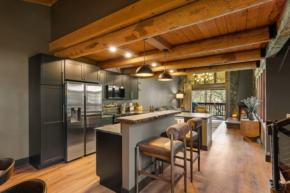 Thoughtfully stocked with premium cookware and appliances, this spacious kitchen is designed for everythig from morning coffee to holiday feasts.