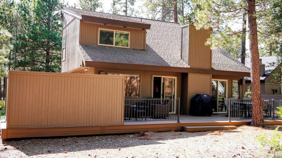 Enclosed hot tub on back of house