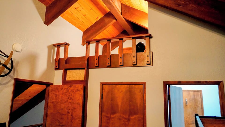 Lit bunk area accessible by ladder