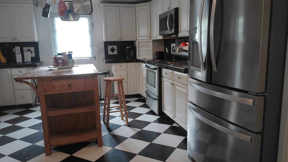 Our Lovely Kitchen, comes with microwave, oven, refrigerator, stovetop, etc.