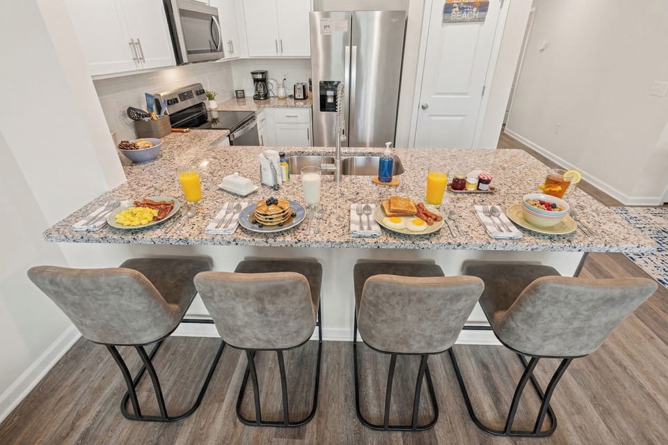 Breakfast for the whole crew — seating for four at the granite bar
