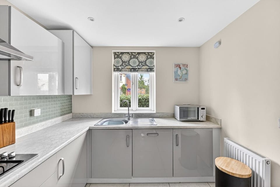 A modern fully equipped kitchen with everything you need to prepare a home cooked meal.