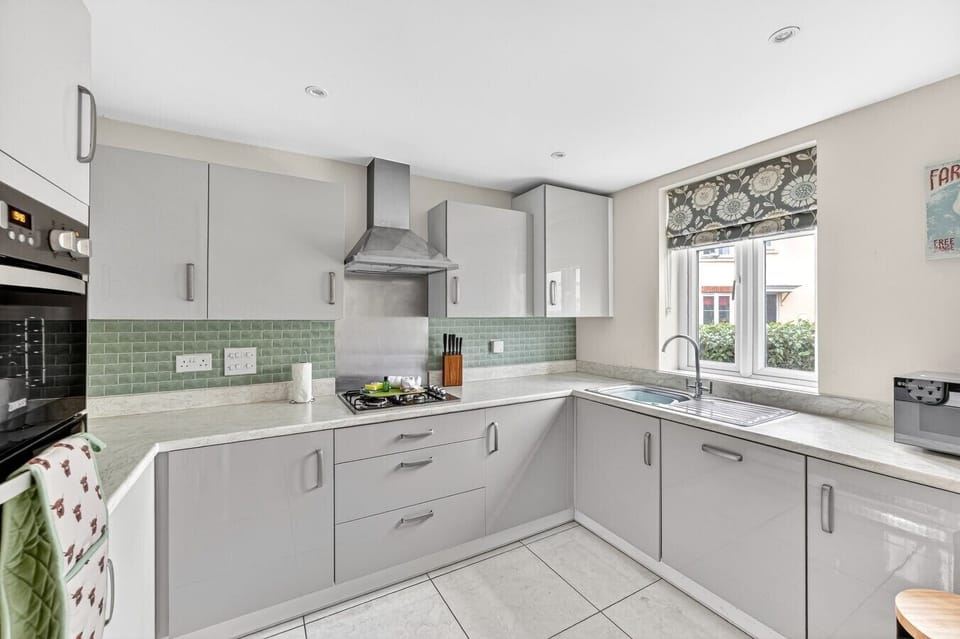A modern fully equipped kitchen with everything you need to prepare a home cooked meal.