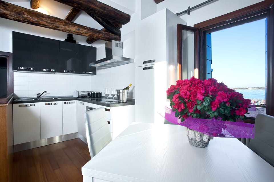 Apartment, 1 Bedroom, Terrace, Lagoon View | Private kitchen | Full-size fridge, microwave, stovetop, dishwasher