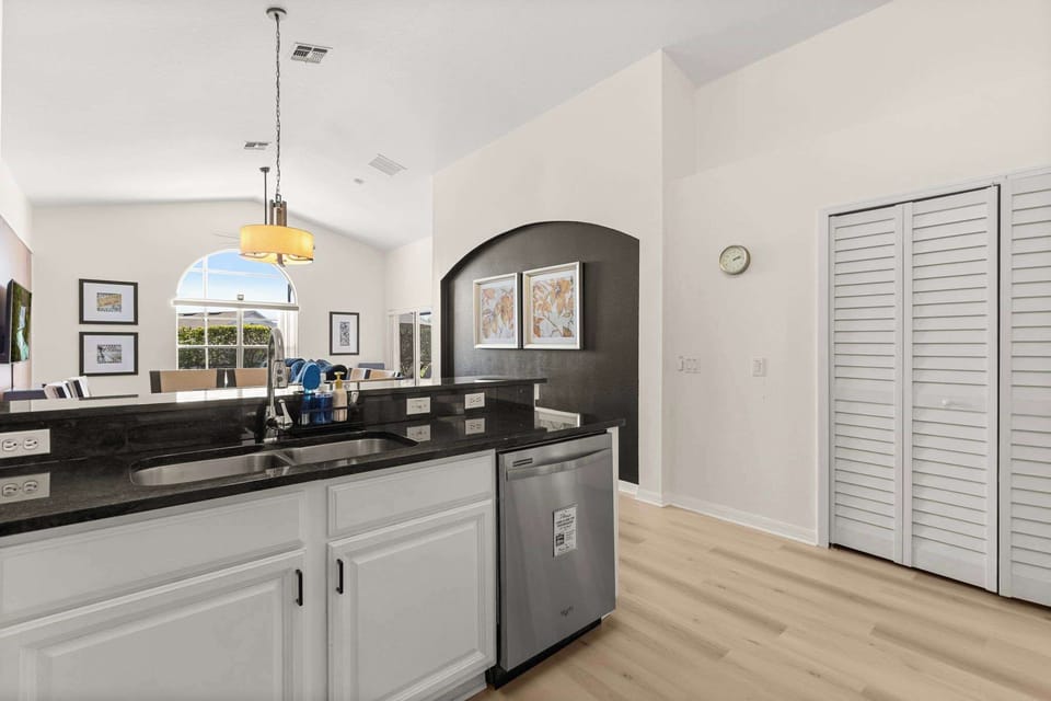 The oversized breakfast bar and open-concept layout make it easy to cook, serve, and stay connected with family and friends throughout the home.