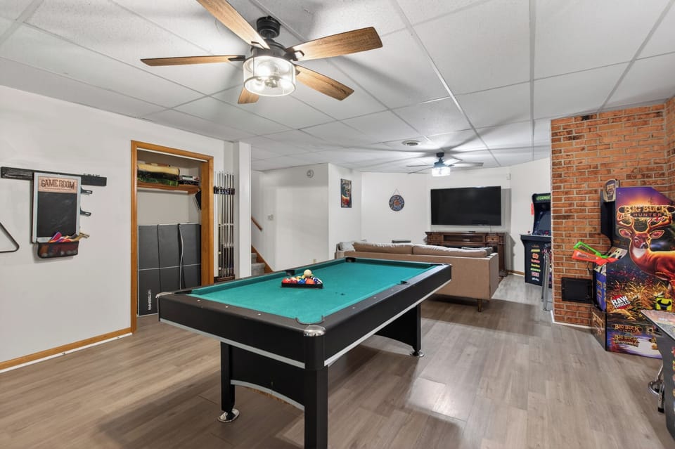 Game Room: Challenge friends to a pool match or enjoy classic arcade games! Fun awaits!