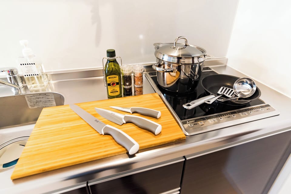 Standard Apartment, Lanai | Private kitchen | Full-size fridge, microwave, stovetop, cookware/dishes/utensils