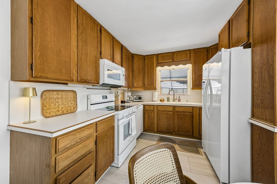 The kitchen is fully stocked with pots/pans, plates, cups, silverware. Everything you need is there and ready to go!