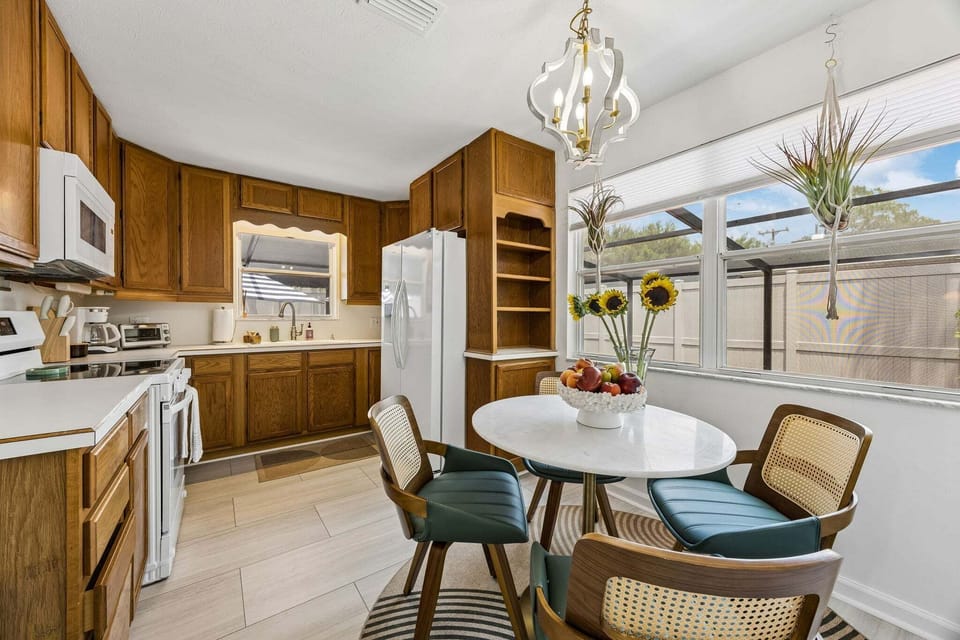 Welcome to the Kitchen! The kitchen is stock with refrigerator, electric range, microwave, dishwasher, standard drip coffee machine, toaster, blender, kitchen table for 4. and high chair