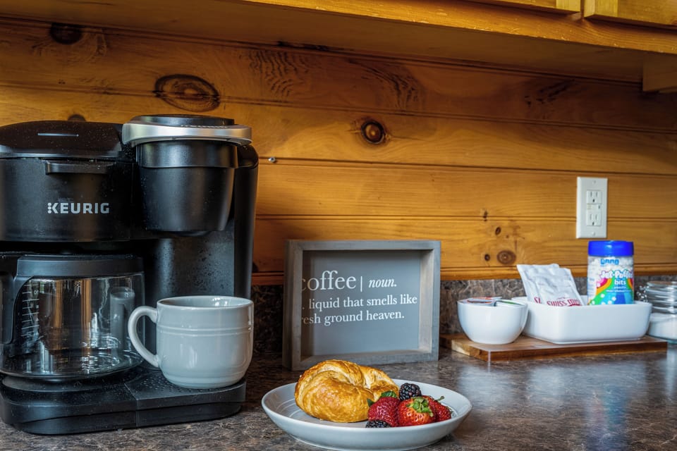 Cozy coffee station with fresh pastries for a welcoming morning treat
