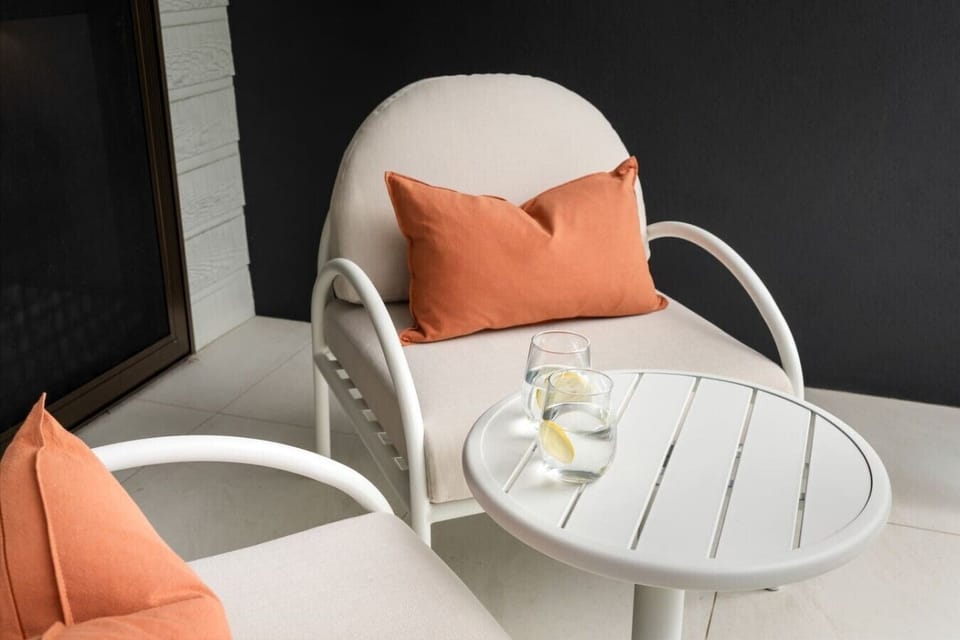 Private upstairs balcony with outdoor seating area