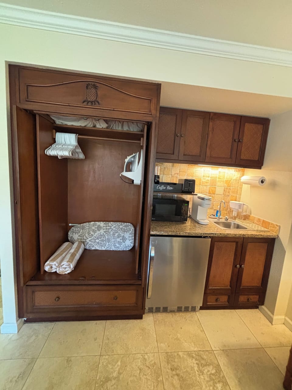Coffee maker, Brita filter, microwave, blender, utensils, dishes. Mini fridge.