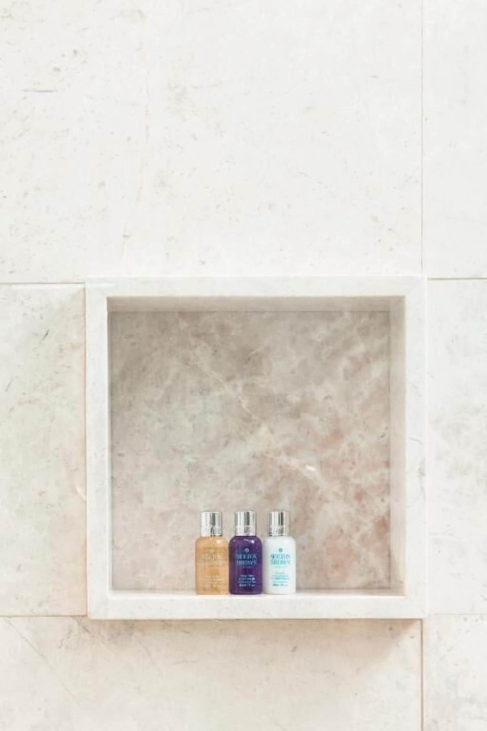 Shower, rainfall showerhead, designer toiletries, hair dryer