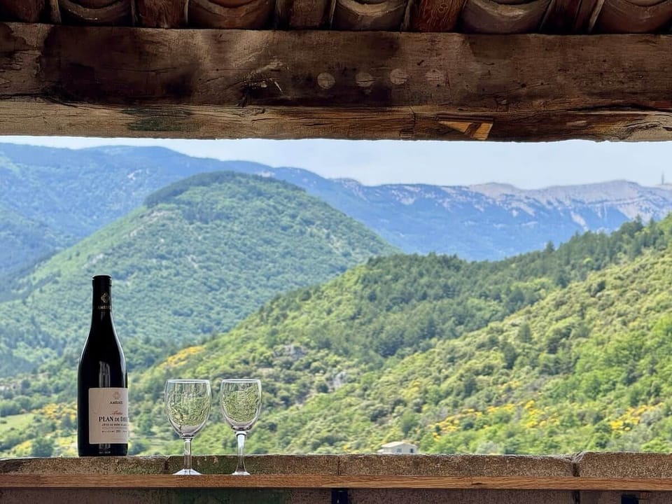 Private terrace with panoramic valley views. Enjoy afternoon and evening sun, comfortable seating, and a sheltered covered area. The perfect place for breakfast, an apéritif, or watching the magnificent Provençal sunsets.