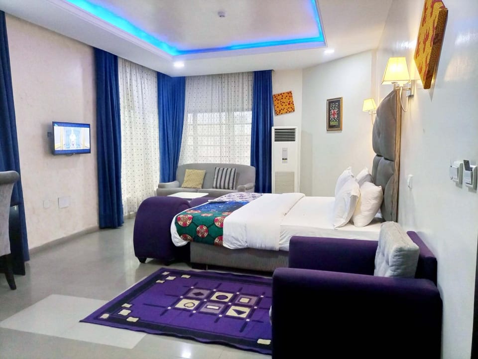 Family Room, Balcony, City View | Desk, laptop workspace, blackout drapes, soundproofing