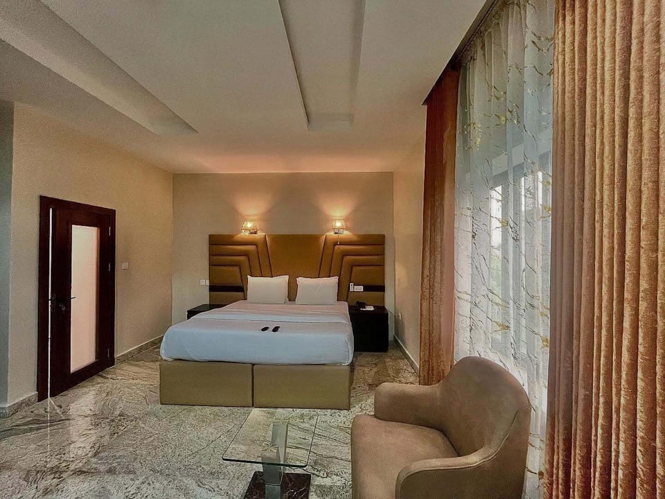 Family Room, Balcony, City View | Desk, laptop workspace, blackout drapes, soundproofing