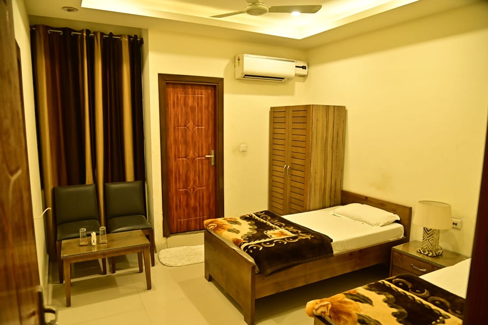 Deluxe Double or Twin Room, City View | Desk, laptop workspace, iron/ironing board, free WiFi
