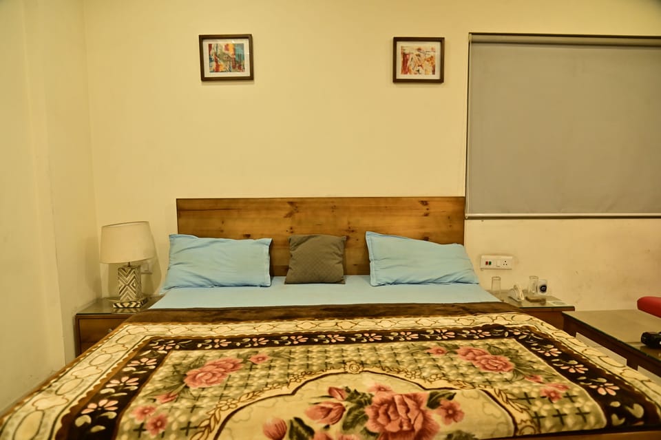 Deluxe Double Room, City View | Desk, laptop workspace, iron/ironing board, free WiFi