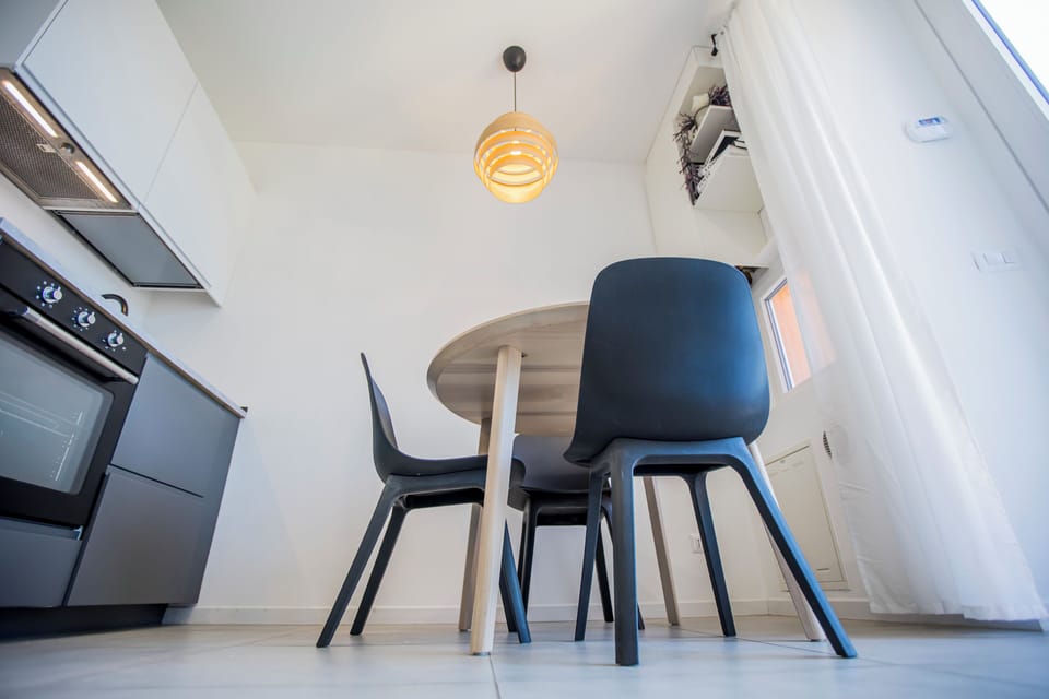 Classic Apartment, Balcony, City View | Private kitchen | Fridge, microwave, oven, stovetop