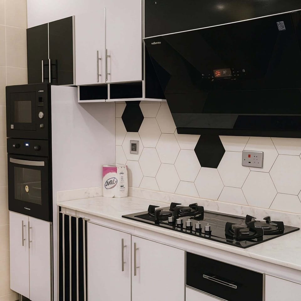 Economy Apartment, Balcony, City View | Private kitchen | Fridge, microwave, oven, stovetop