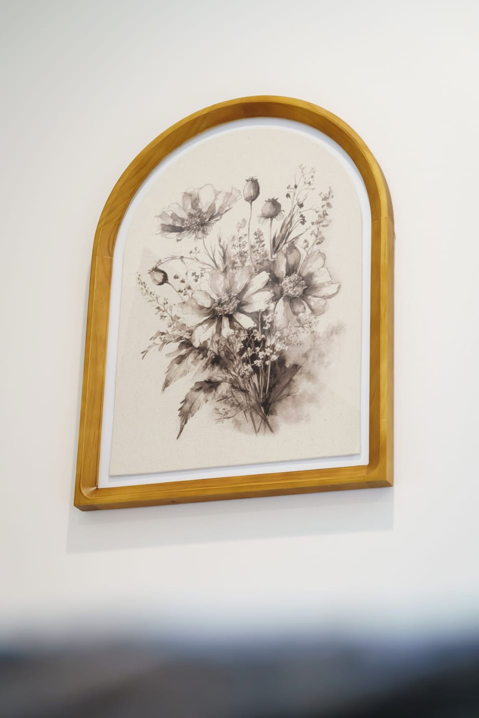 Charming wall art adds a soft, thoughtful touch to the space.
