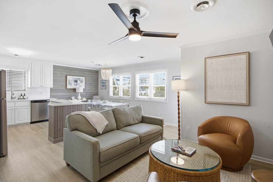  Inviting living space with comfortable seating and an airy open layout flowing seamlessly to the kitchen