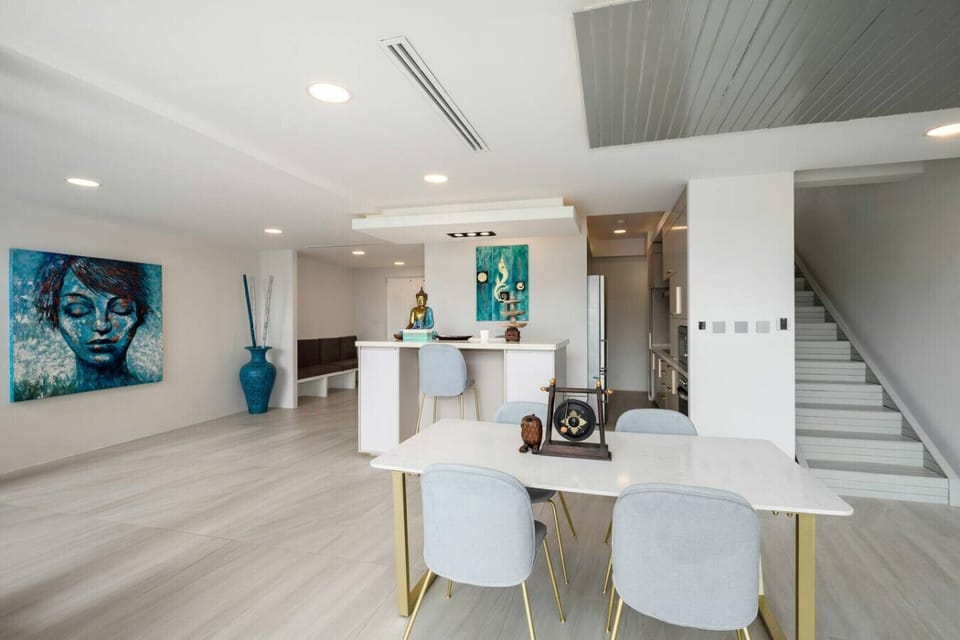 Modern open interior with designer staircase at Villa J3, Replay Residence Bangrak Koh Samui