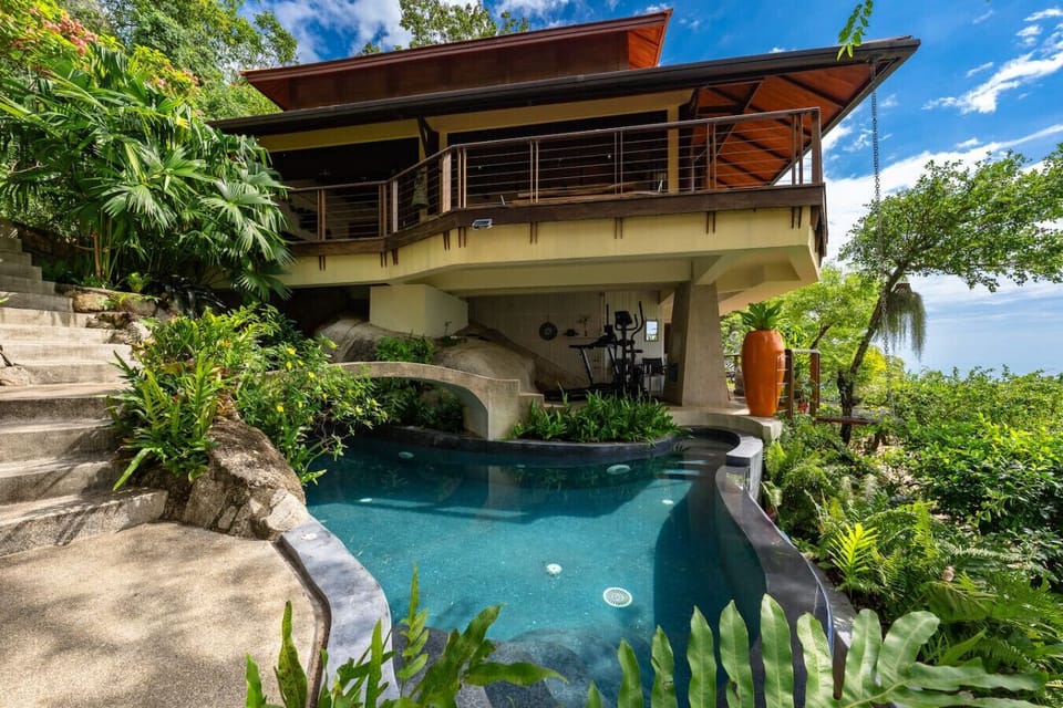 Stunning swimming pool at Bang Kao villa rental with tropical gardens and Koh Tan Koh Matsum island views