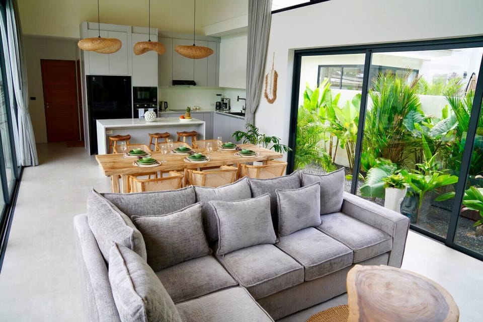 Spacious living and dining area in Bophut holiday villa with open-plan tropical design