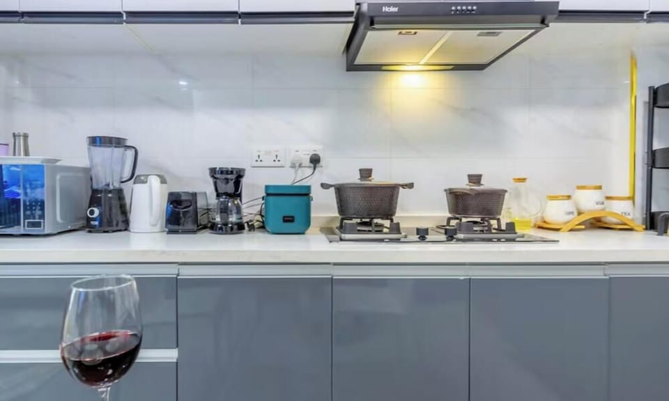 Deluxe Apartment, City View | Private kitchen | Full-size fridge, microwave