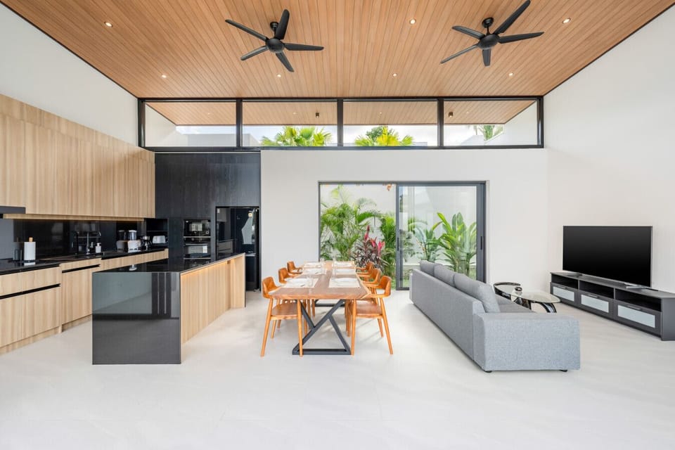 Spacious Open Living Area - Modern Kitchen, Dining & Living Combined with High Wood Ceiling