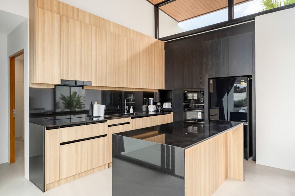 Stunning Kitchen with Black Granite Island - Wood Ceiling & Premium Appliances