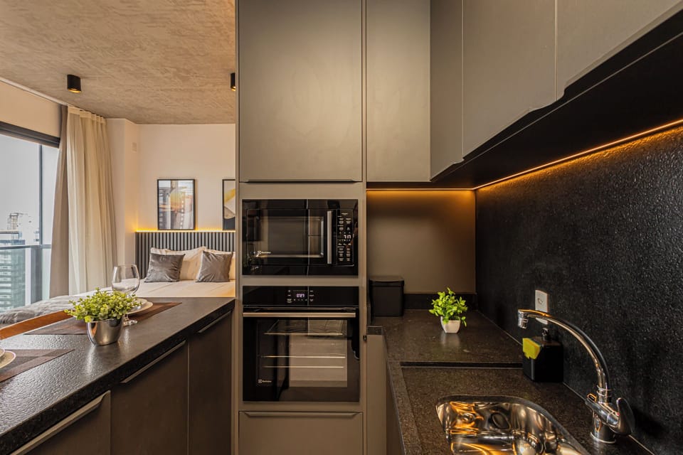 Comfort Apartment | Private kitchen | Microwave, stovetop, coffee/tea maker, electric kettle