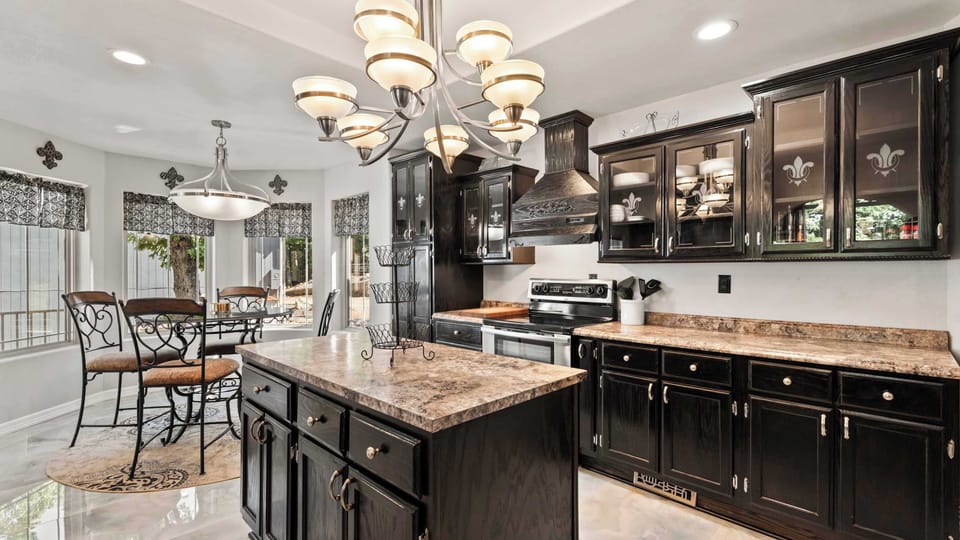 The elegant kitchen offers ample space & all the comforts of home​