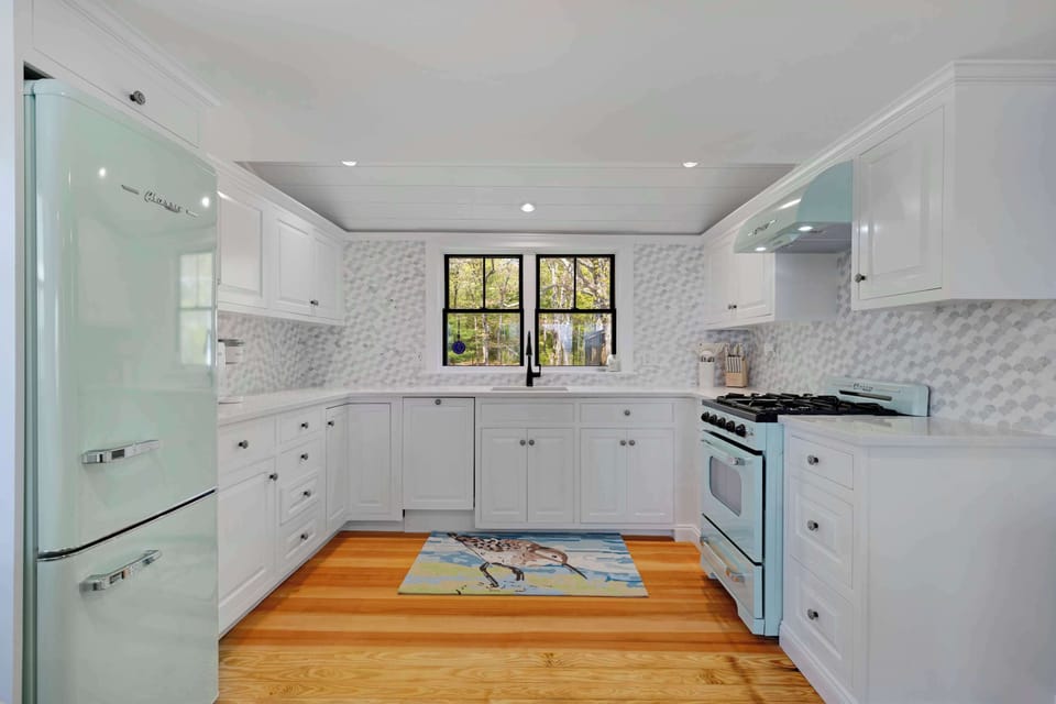 The kitchen is brand new and offers high end finishes. 