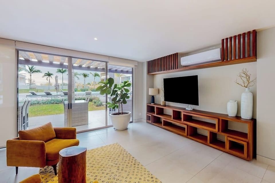 Studio, 1 Queen Bed, City View (Carmely Velas Paradise # 2403A) | Living area