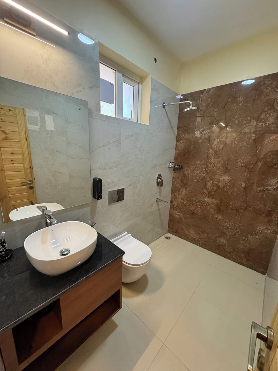 Separate tub and shower, towels, soap, shampoo