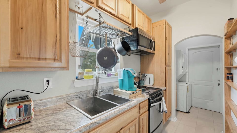 Enjoy the convenience of a kitchenette and in-unit laundry, making extended stays easy and comfortable.