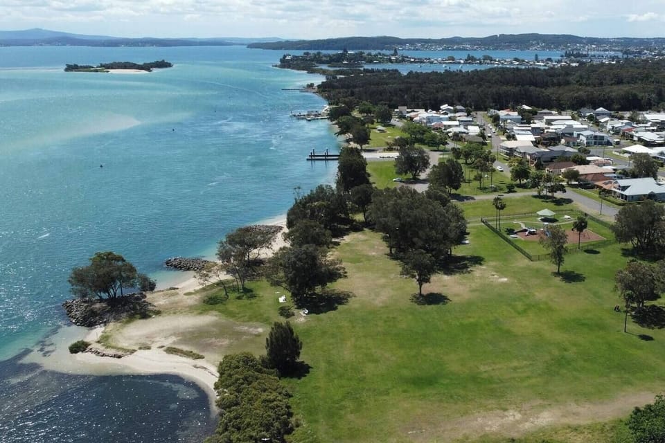 Discover the stunning coastline surrounding Swansea Channel, where golden beaches, turquoise water and scenic headlands invite endless days outdoors.