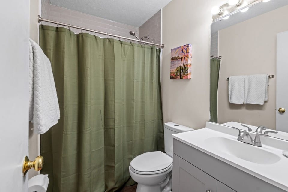 Full bathroom with tub and shower