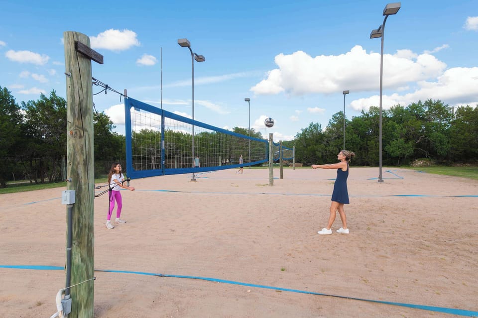 Enjoy friendly competition and active fun on the sand volleyball court, the perfect outdoor amenity for guests to stay active and make lasting memories together.