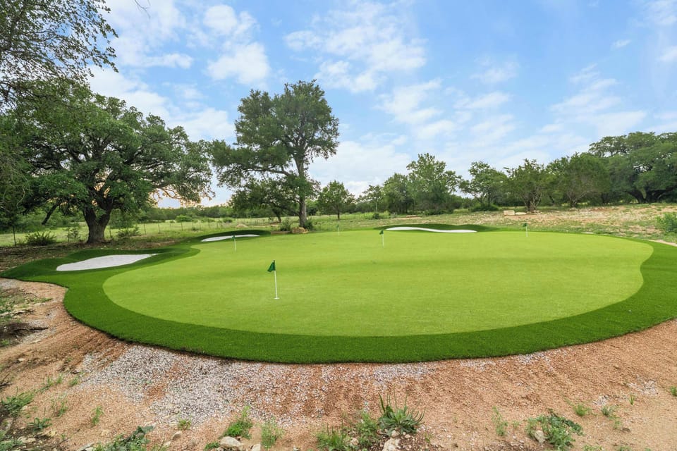 Your own private par 3 golf course. A Jack Nicklaus designed turf course, featuring three full sized greens, turf bunkers, multiple pin locations and nine tee boxes. 