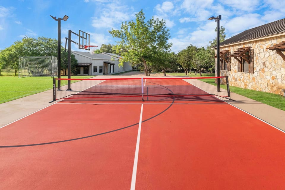 Your private hill country entertainment complex. From pickleball rallies to pickup basketball games, the custom sports court is perfect for friendly competition and unforgettable fun—all without ever leaving the property.