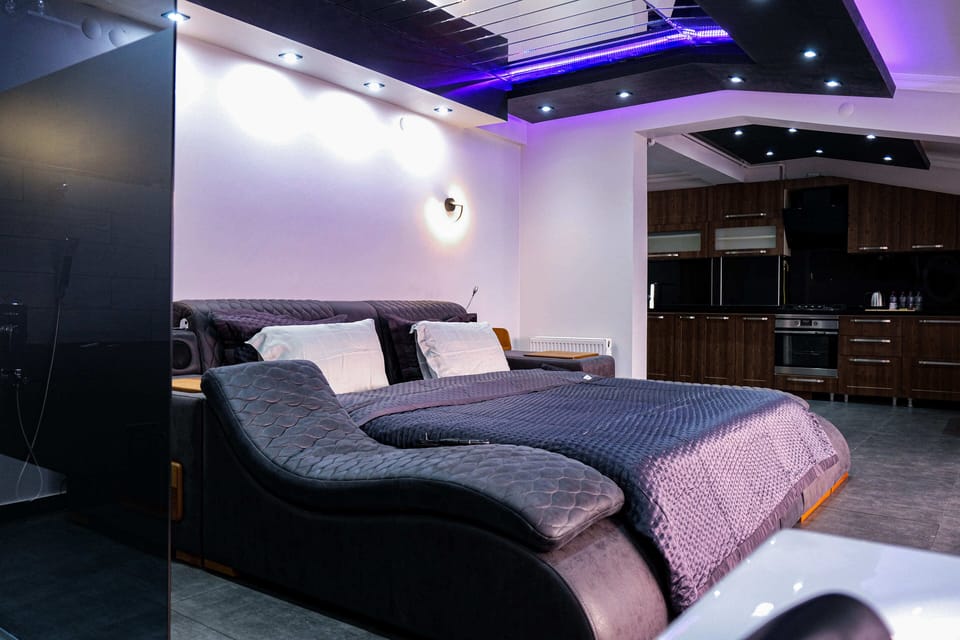 Premium Studio Suite, 1 King Bed, City View | Desk, blackout drapes, iron/ironing board, free WiFi