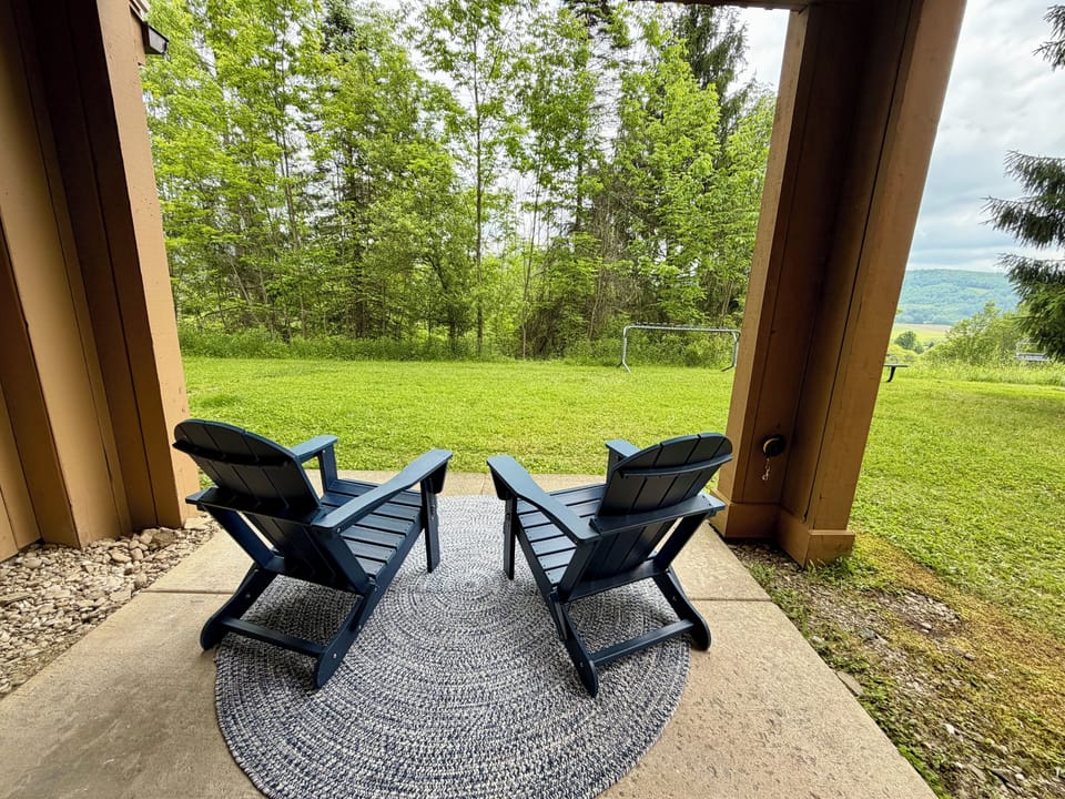 Patio overlooking the woods and The Wall trail